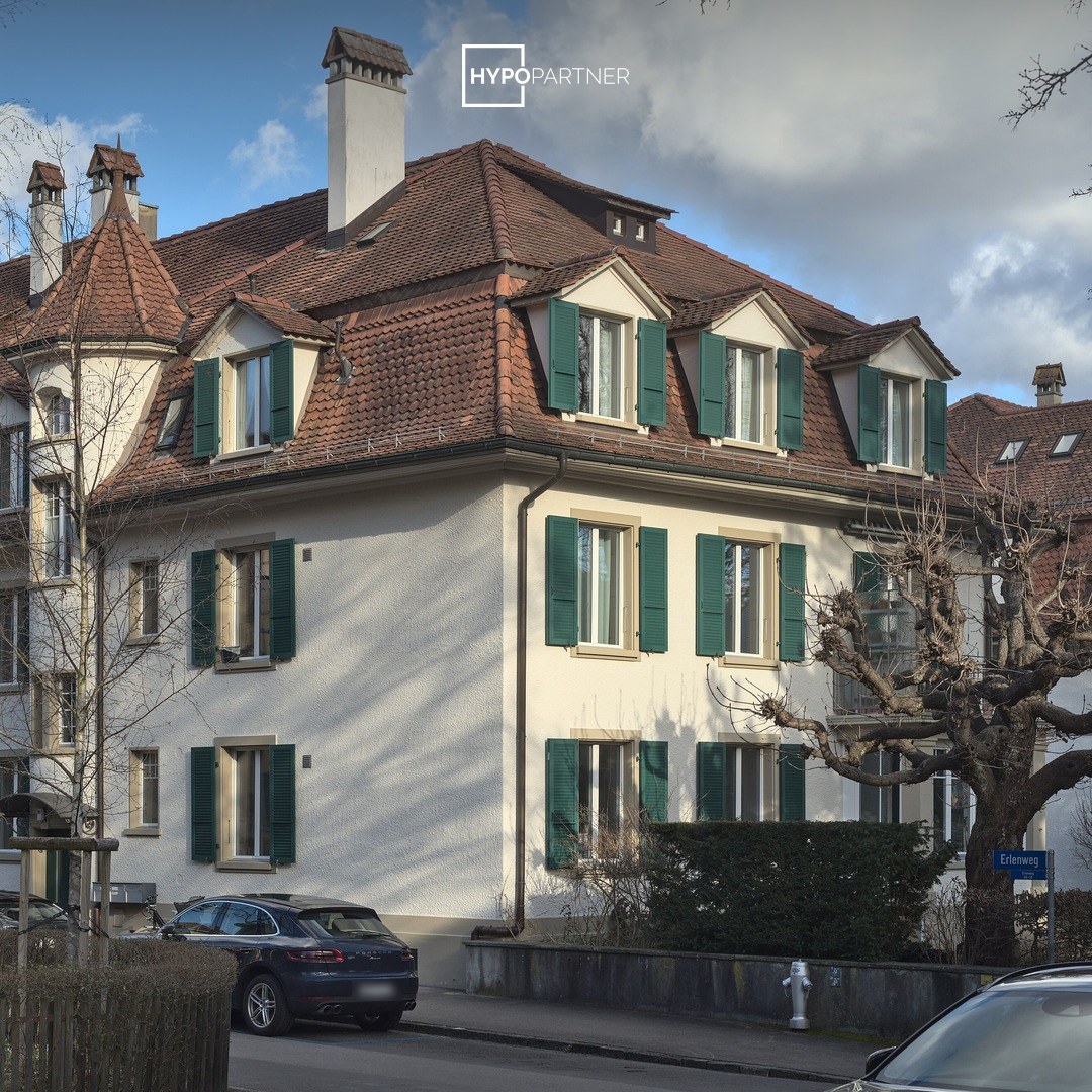 Mehrfamilienhaus am Erlenweg in Bern mit HYPOPARTNER-Logo